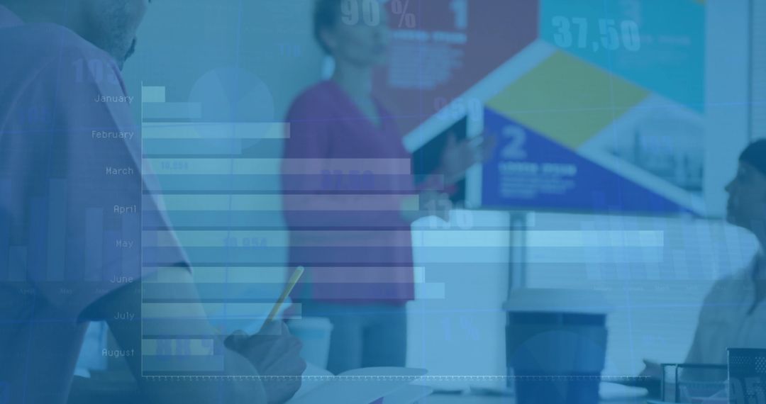 Team Collaboration Analyzing Financial Trends in Meeting Room