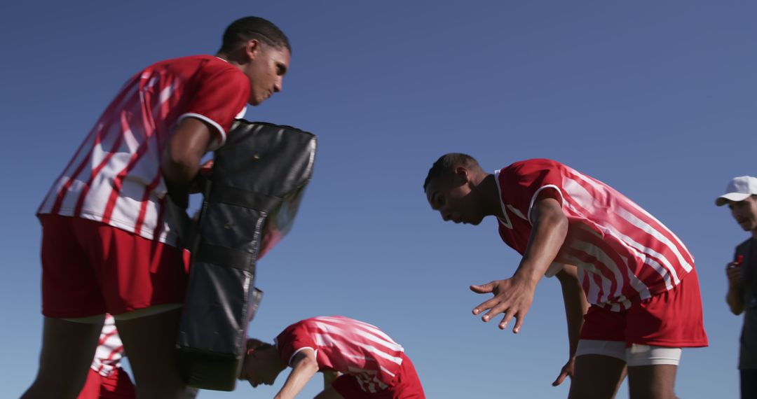 Rugby Players Training Outdoors Under Blue Sky - Free Images, Stock Photos and Pictures on Pikwizard.com