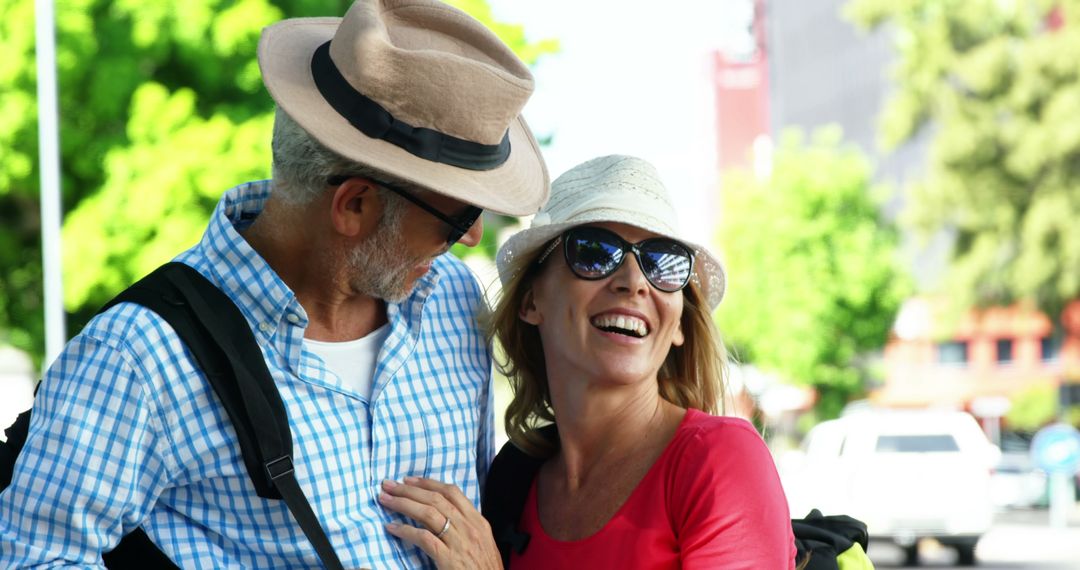 Smiling Mature Couple Enjoying a Sunny Day Outdoors