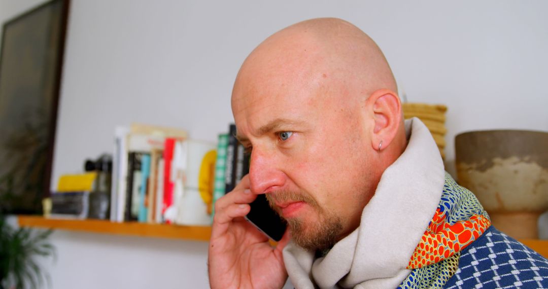Bald Caucasian Man Communicating On Smartphone In Domestic Environment