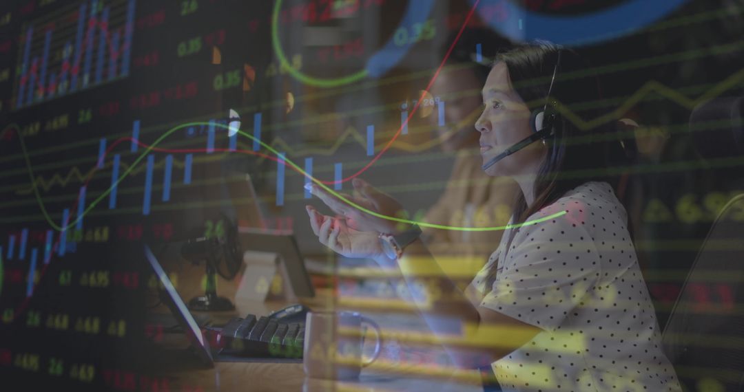 Diverse Businesswoman Analyzing Financial Data on Laptop
