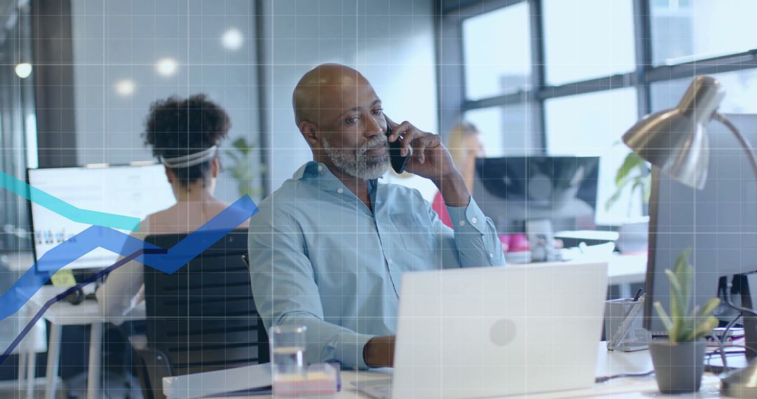 Diverse Business People Analyzing Financial Data in Office