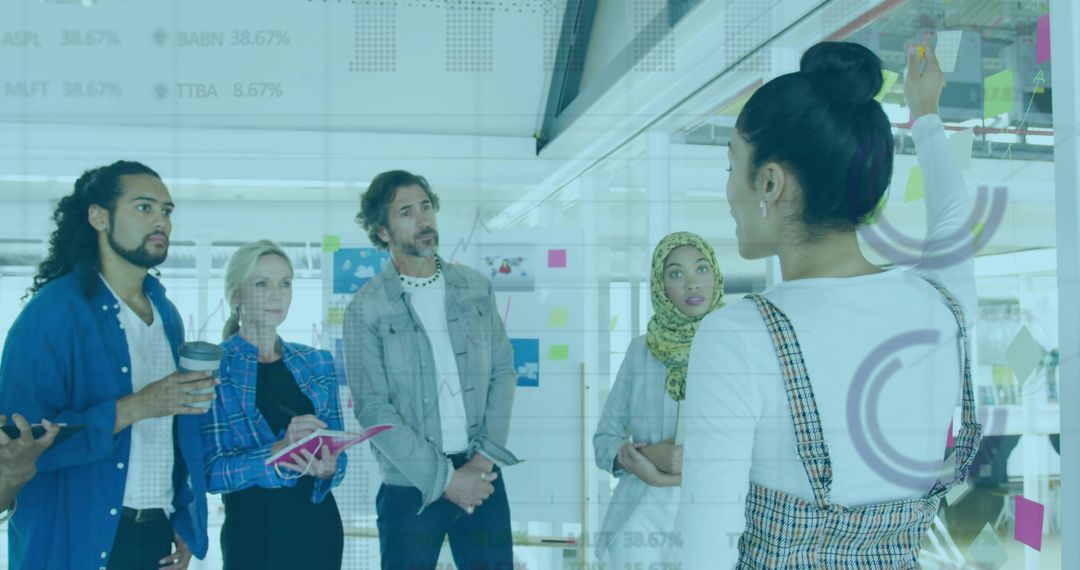 Diverse Team Brainstorming in a Modern Office Setting