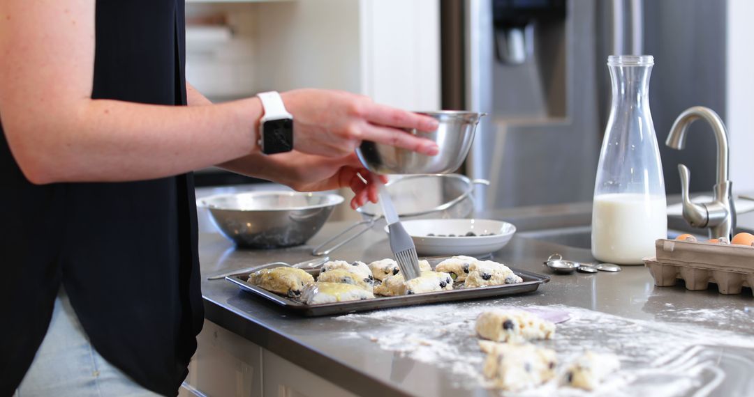 Person Preparing Blueberry Scones in Modern Kitchen - Free Images, Stock Photos and Pictures on Pikwizard.com