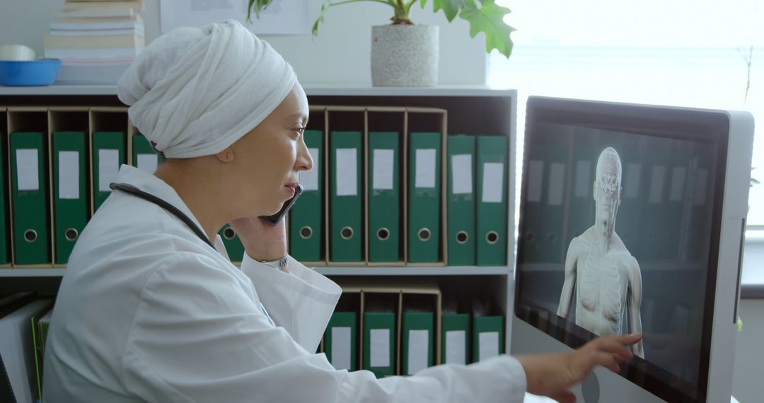 Doctor Discussing MRI Scan Results with Patient via Phone - Free Images, Stock Photos and Pictures on Pikwizard.com