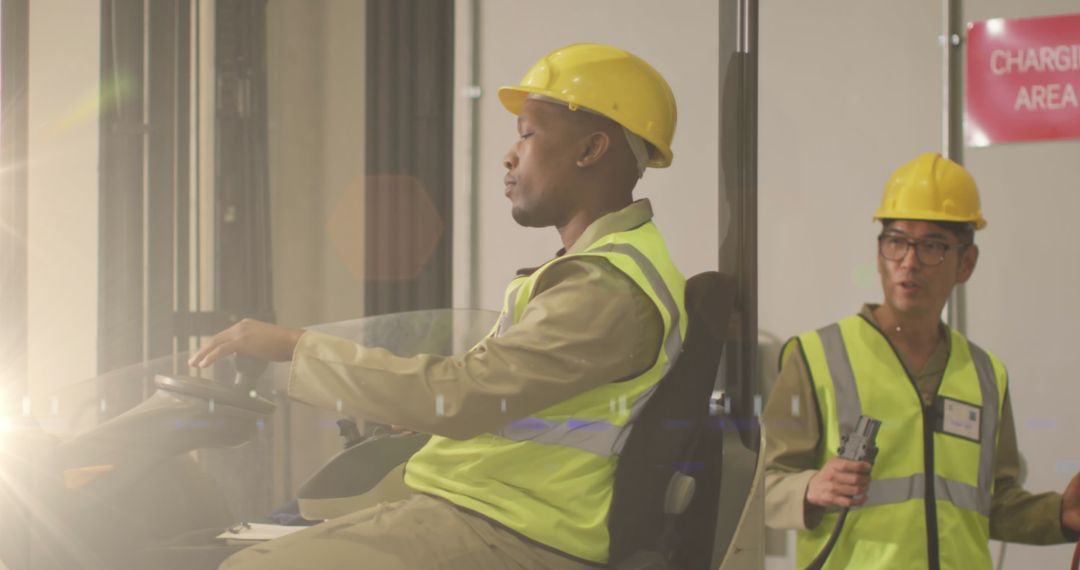 Diverse Factory Workers Operating Forklift with Sun Flare