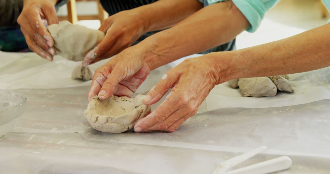 Adults Shaping Clay Art in Creative Pottery Workshop - Free Images, Stock Photos and Pictures on Pikwizard.com