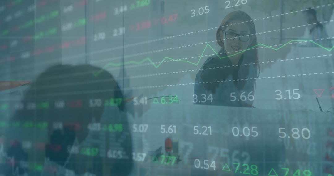 Businesswoman Analyzing Financial Data in Modern Workspace