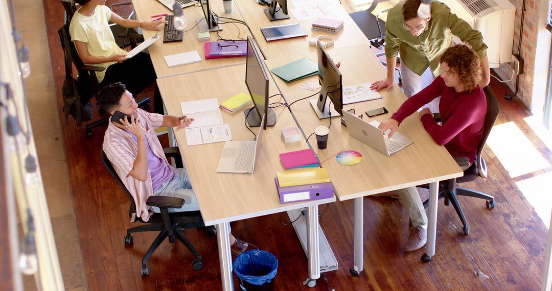Diverse Team Collaborating in Modern Casual Office Setting