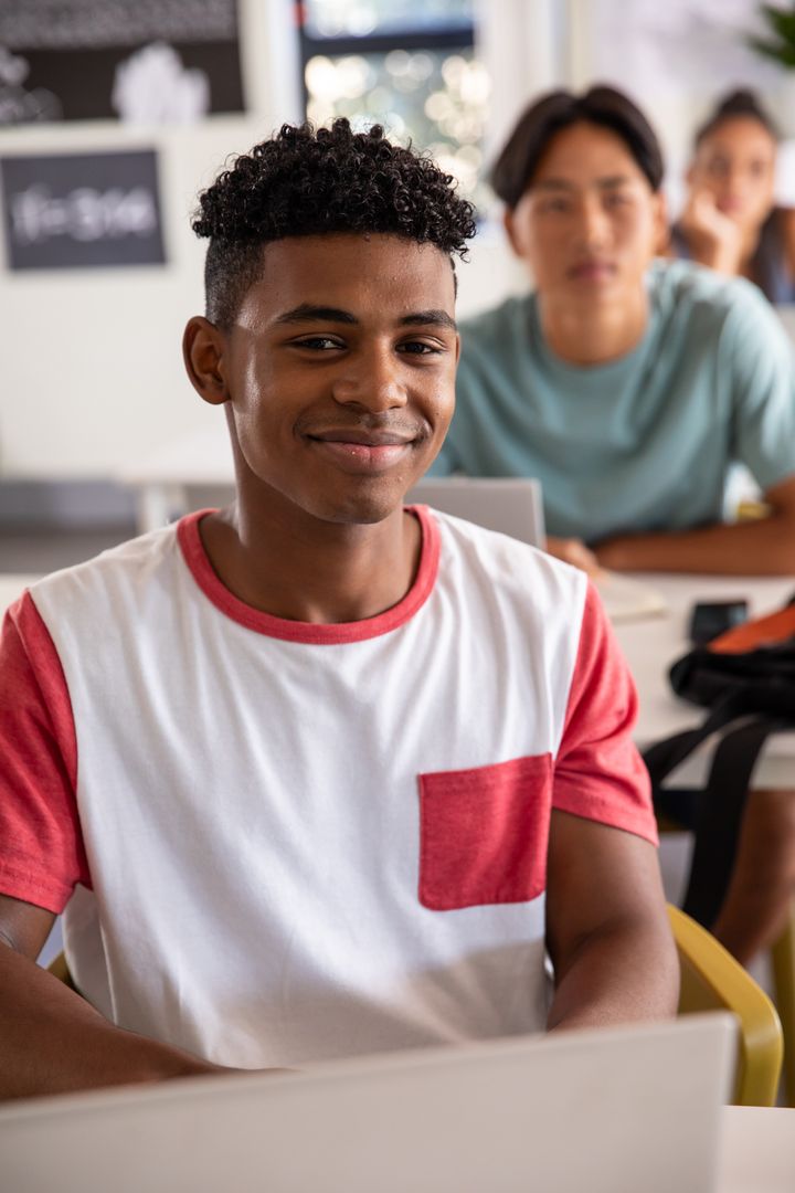 Diverse Teenage Classmates Engaged in Classroom Learning