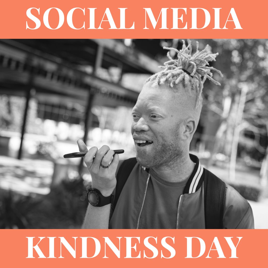 Albino Man with Dreadlocks Engaging with Technology on Social Media Kindness Day