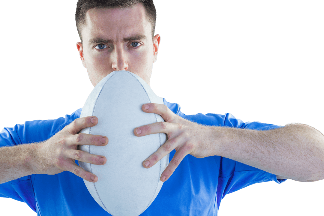 Focused Rugby Player Holding Ball Against Transparent Background