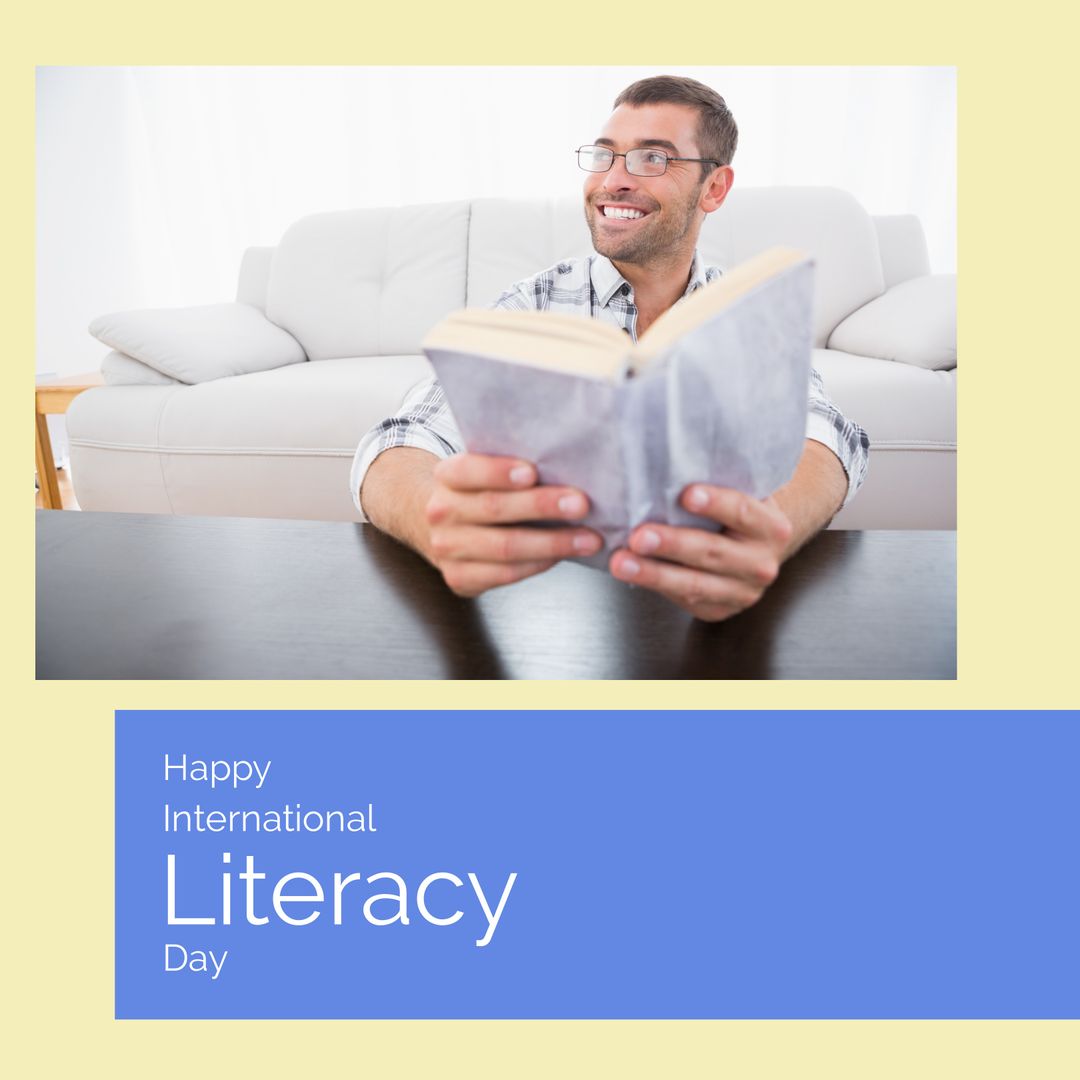 Smiling Man Reading Book Celebrating International Literacy Day