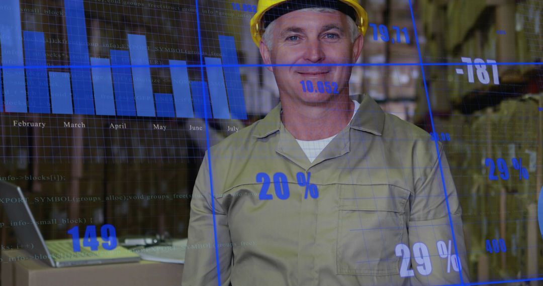 Warehouse Supervisor Wearing Hard Hat Monitoring Logistics Data on Laptop with Blue Overlay