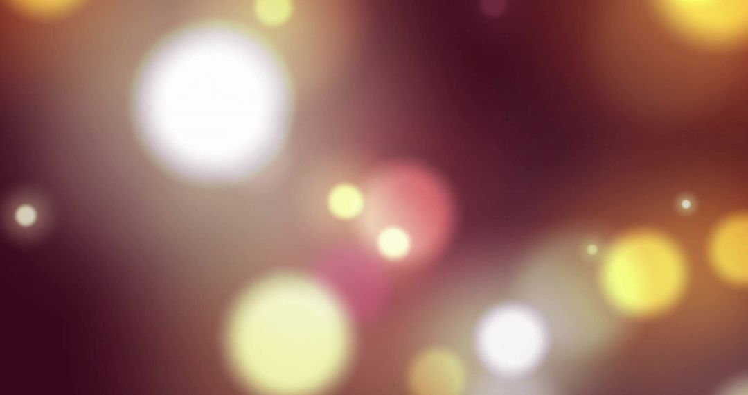 Colorful Abstract Bokeh of Warm Lights Over Dark Background