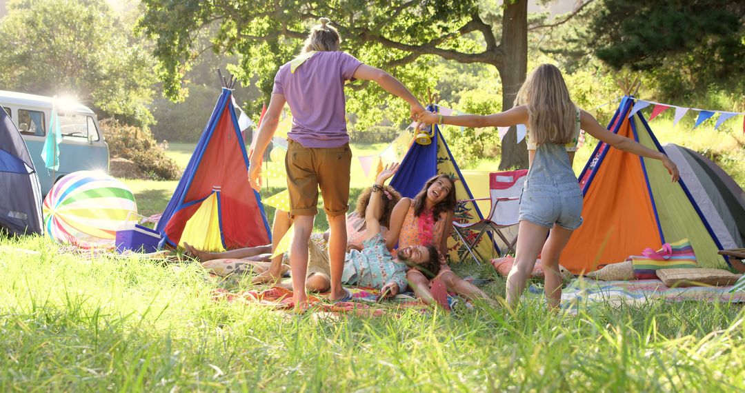 Friends Enjoying Summer Camping in Colorful Tents - Free Images, Stock Photos and Pictures on Pikwizard.com