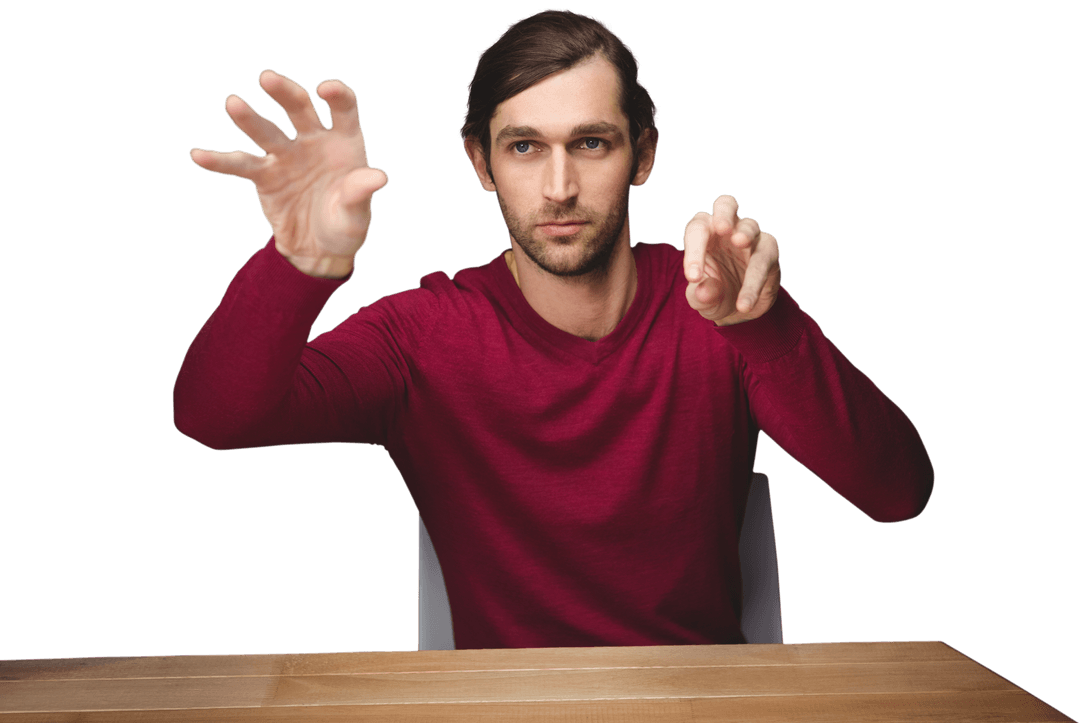 Man in Red Sweater Making Hand Gestures at Desk with Transparent Background