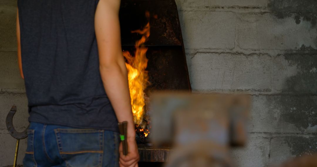 Blacksmith Working Near Forging Furnace - Free Images, Stock Photos and Pictures on Pikwizard.com