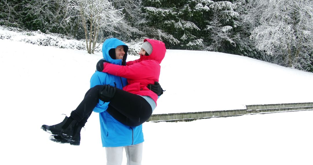 Couple Embraced in Snowy Winter Wonderland