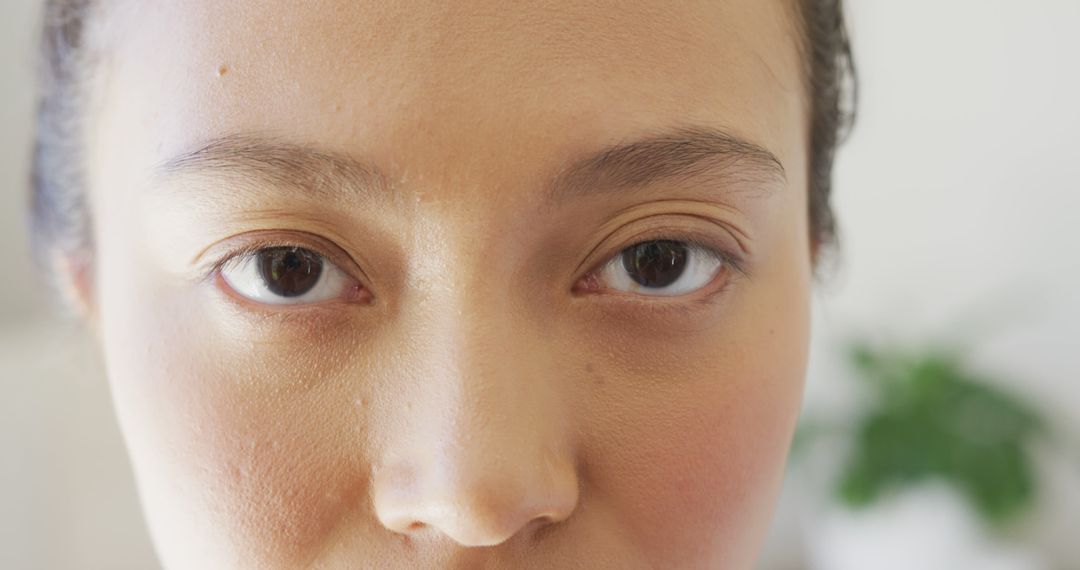 Close-Up of Woman Looking into Camera for Introspective Mood