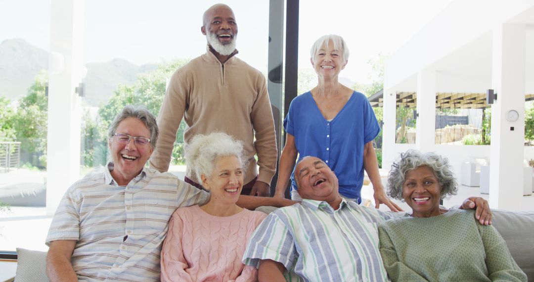 Joyful Diverse Group of Senior Friends Laughing and Relaxing Together - Free Images, Stock Photos and Pictures on Pikwizard.com