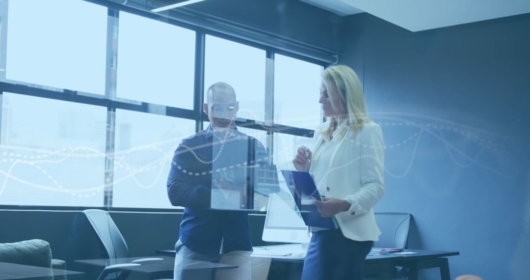 Modern Business Colleagues Analyzing Data in Bright Office