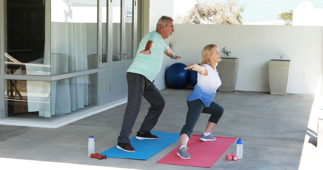 Senior Couple Practicing Yoga on Patio in Morning Sun - Free Images, Stock Photos and Pictures on Pikwizard.com