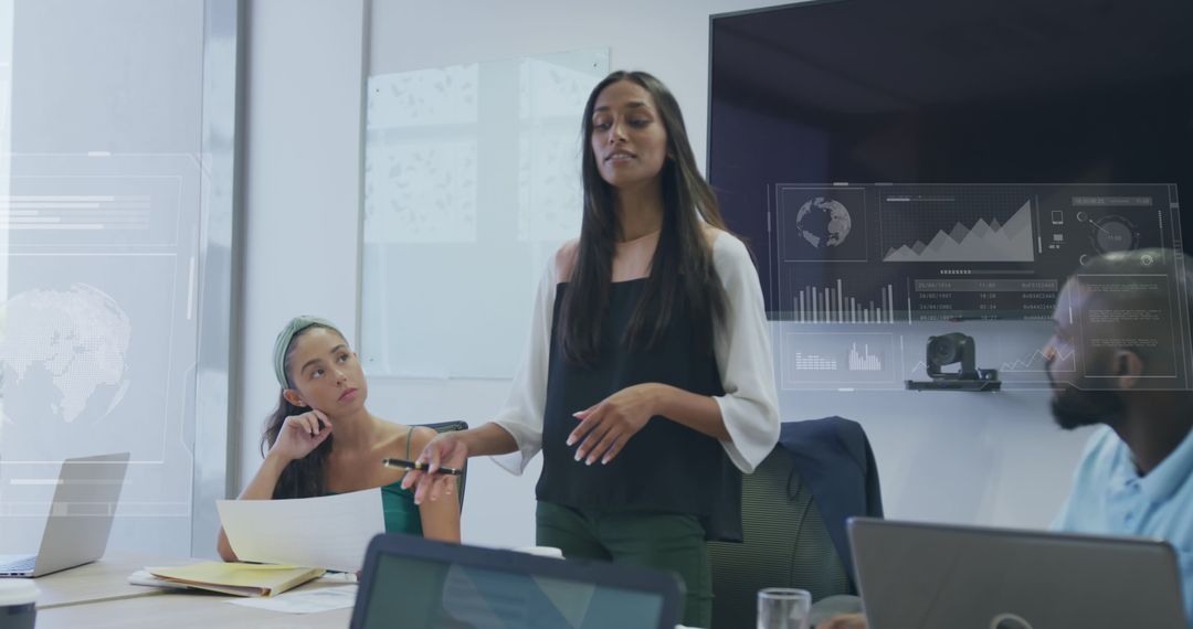 Diverse Team Discussing Financial Strategy in Modern Office