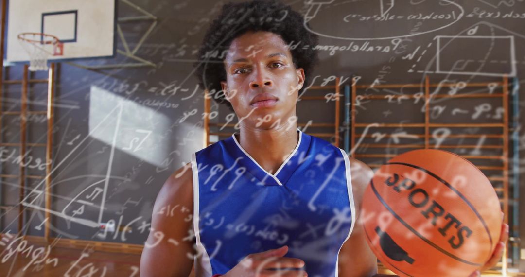 Basketball Player Analyzing Strategy in Gymnasium