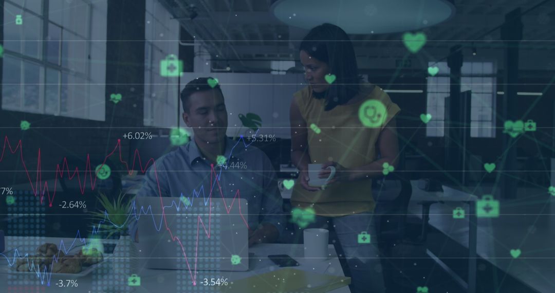 Diverse Professionals Discussing Health Technology Data in Modern Office