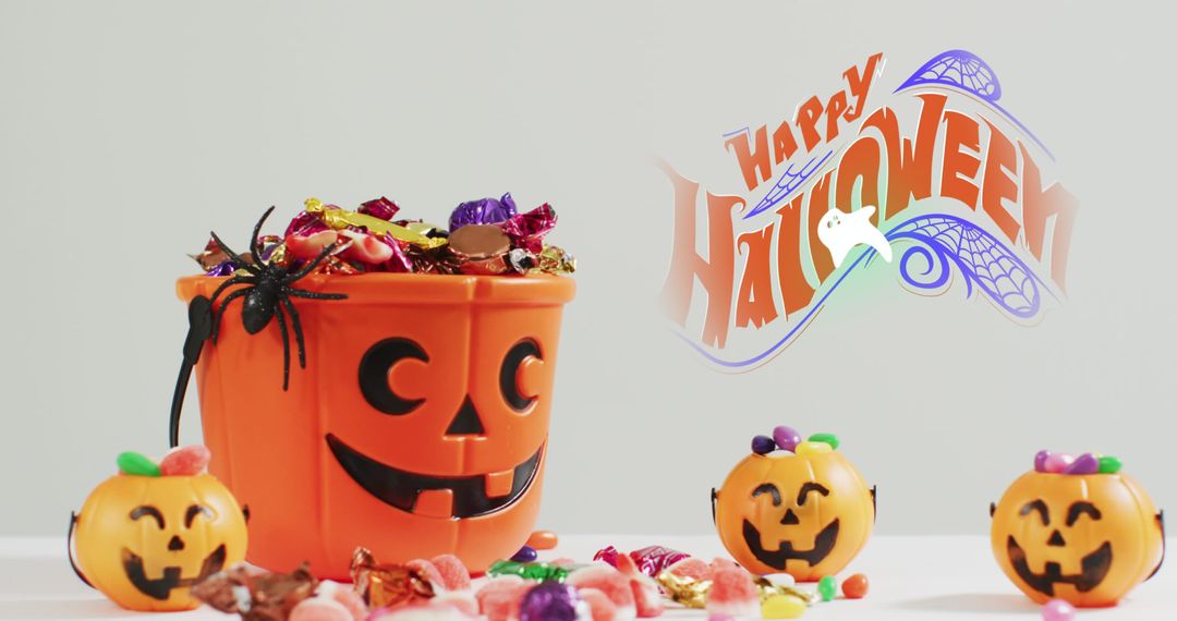 Halloween Pumpkin Bucket Filled with Assorted Candy and Decorations