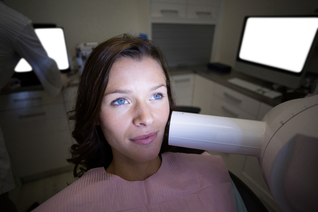 Woman in Dental Chair Receiving Examination with Transparent Equipment - Download Free Stock Images Pikwizard.com