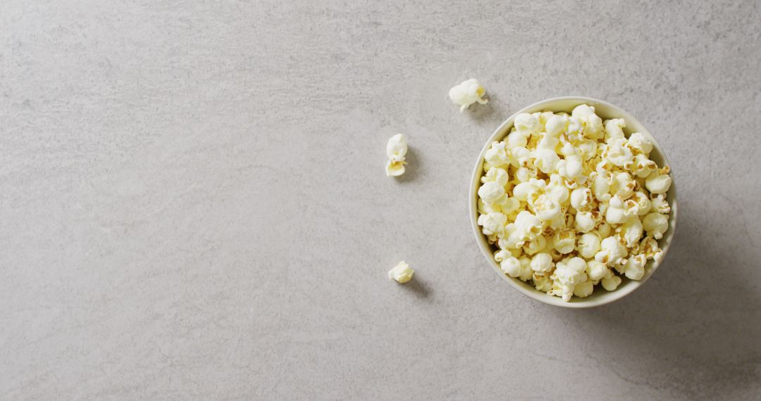 Bowl of Fresh Popcorn on Minimalistic Gray Background - Free Images, Stock Photos and Pictures on Pikwizard.com