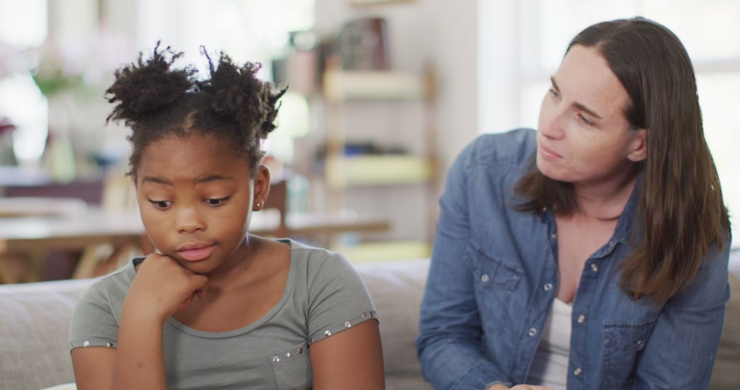 Concerned Parent Listening to Upset Child at Home