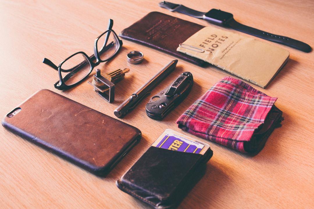 Flat Lay of Everyday Carry Essentials on Wooden Desk - Free Images, Stock Photos and Pictures on Pikwizard.com