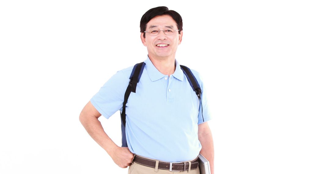 Smiling Middle-Aged Asian Man with Backpack on White Background