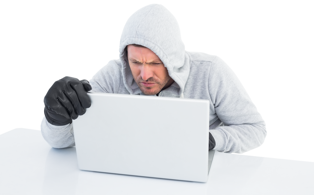 Hooded Hacker Using Laptop with Intense Focus - Transparent Background - Download Free Stock Images Pikwizard.com