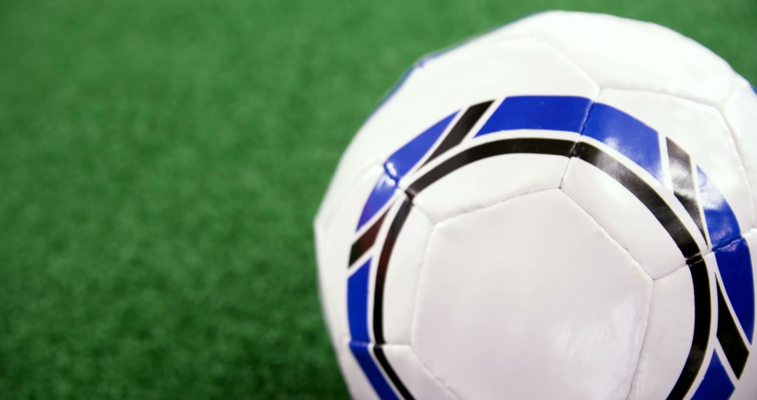 Soccer Ball on Green Artificial Turf Signifying Sports Energy - Free Images, Stock Photos and Pictures on Pikwizard.com