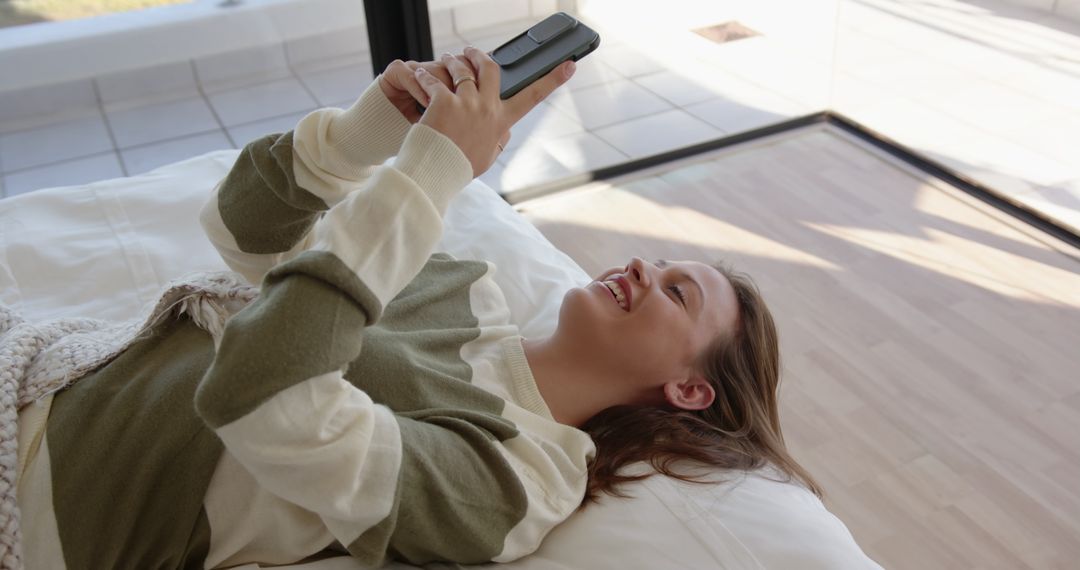 Relaxed Woman Enjoying Digital Content at Home
