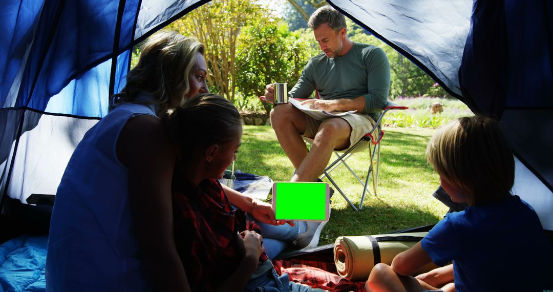 Family Bonding in Camping Tent with Tablet Discussion - Free Images, Stock Photos and Pictures on Pikwizard.com