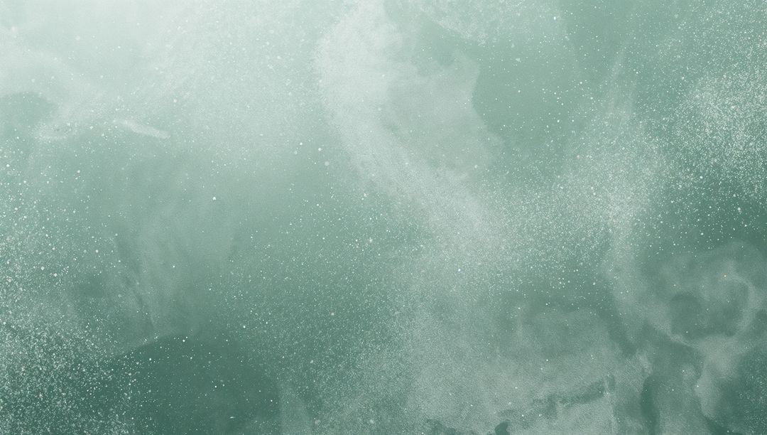 Teal-green nebula dust abstract background with misty swirls and speckled texture