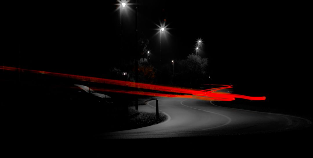 Curving Road at Night with Red Car Light Trails - Free Images, Stock Photos and Pictures on Pikwizard.com