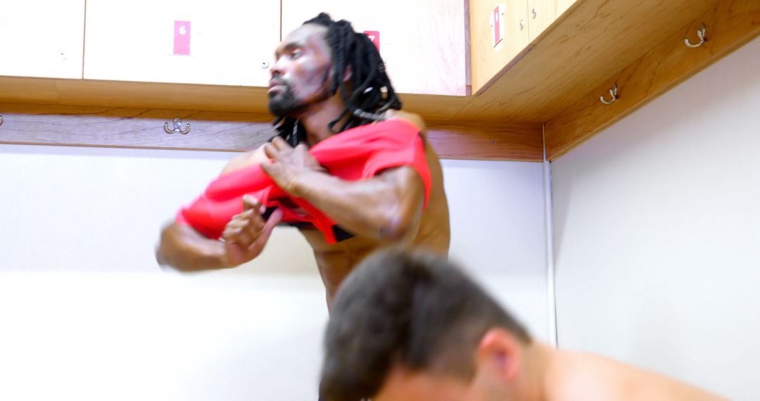 Athletes Changing in Locker Room After Training Session - Free Images, Stock Photos and Pictures on Pikwizard.com