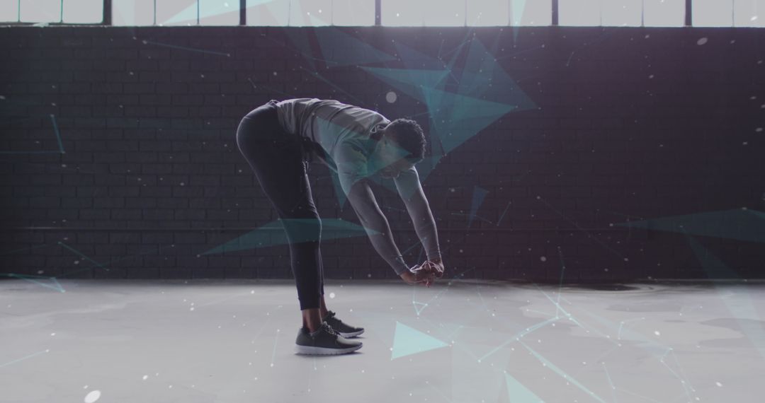 Man Stretching with Digital Network Effects in Gym Setting