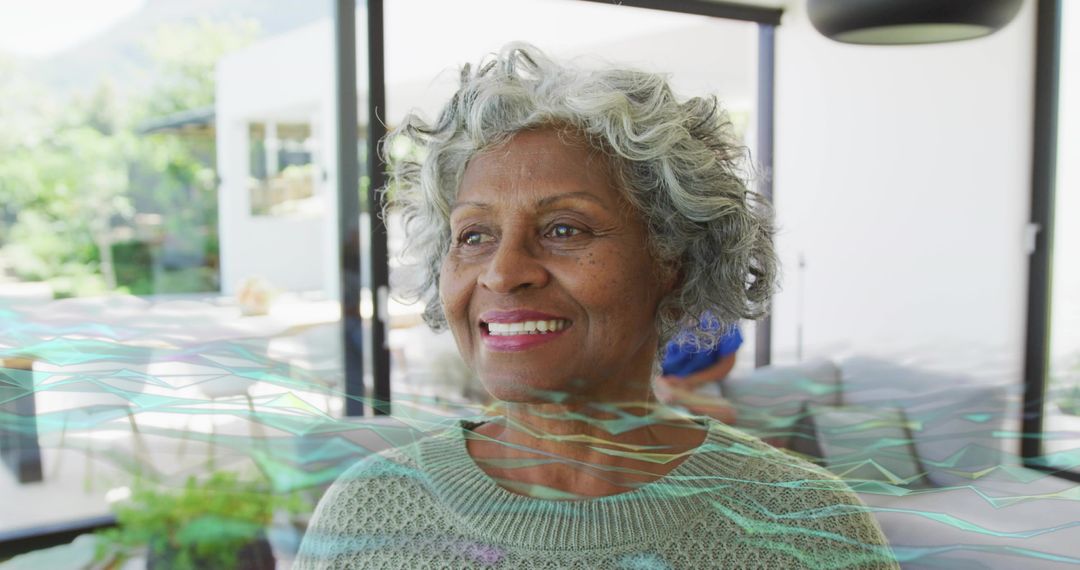 Smiling senior woman standing by glass doors with digital waveforms conveying wellness and resilienc