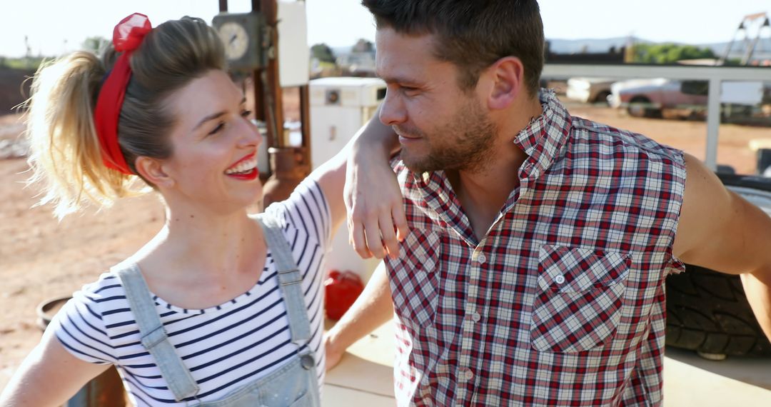 Cheerful Couple Enjoying Sunshine in Rustic Countryside - Free Images, Stock Photos and Pictures on Pikwizard.com