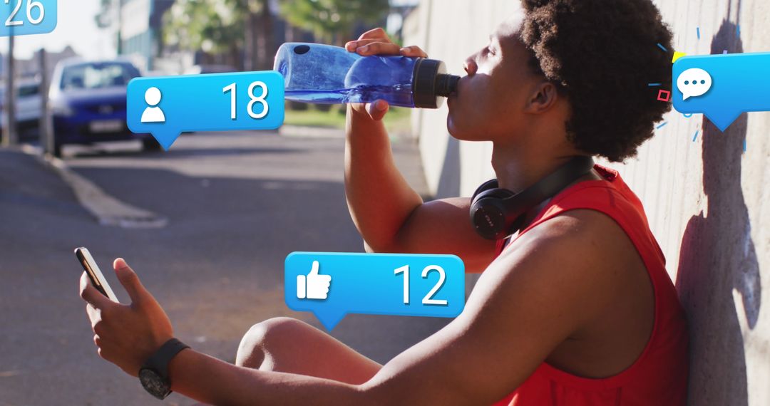 Man Engaged With Social Media While Hydrating on Run