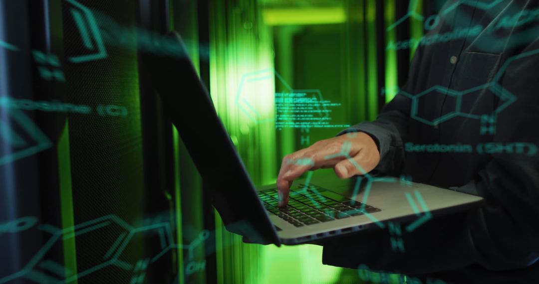 Engineer Saying Data Codes on Laptop in Server Room