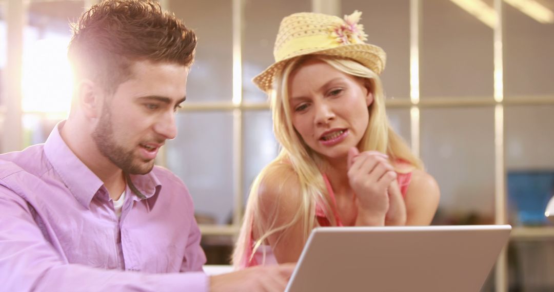 Young Professionals Collaborating in Creative Workspace