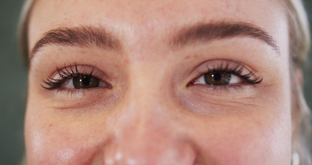 Close-up of Woman with Beautiful Eyes and Thick Eyebrows - Free Images, Stock Photos and Pictures on Pikwizard.com